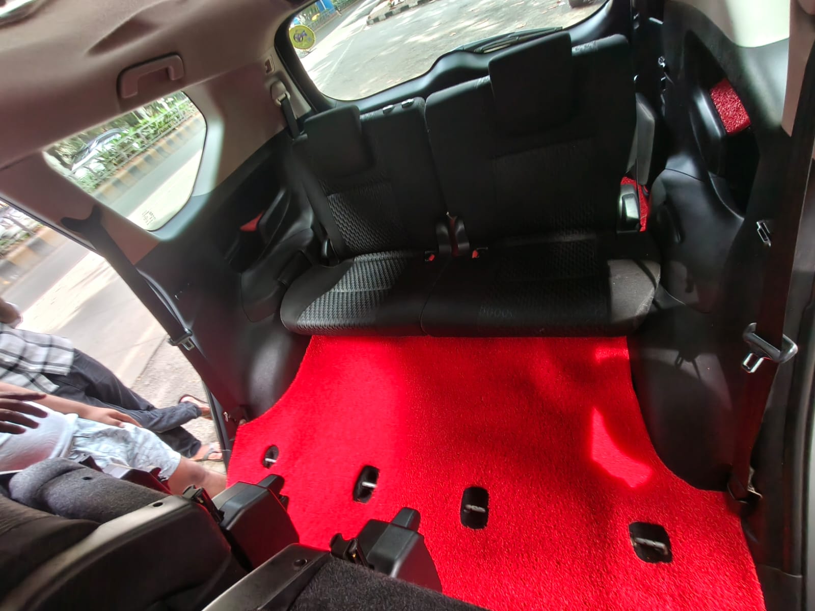 Third-row seats and floor mats in our Toyota Innova Crysta