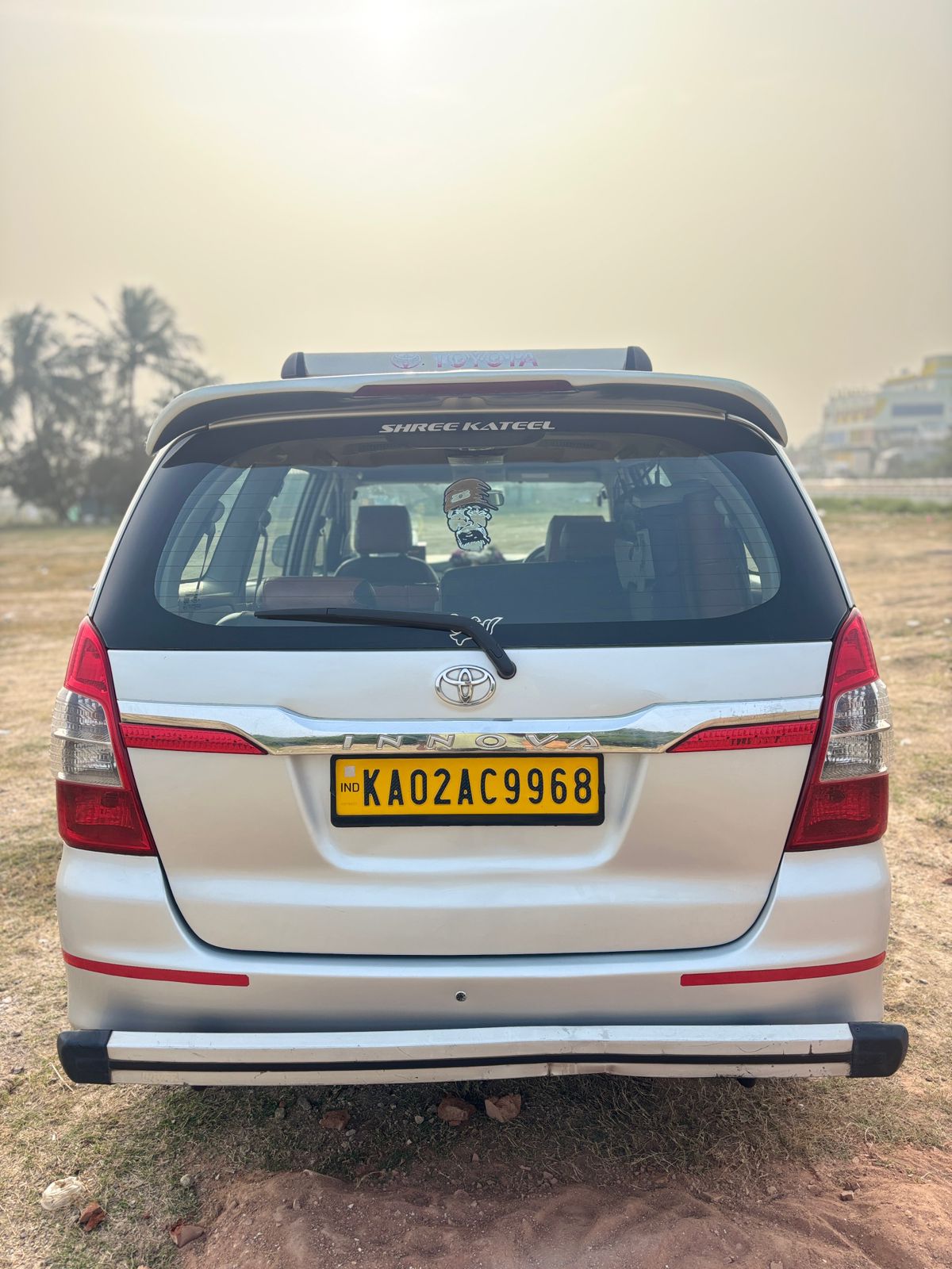 Our silver Toyota Innova, rear view